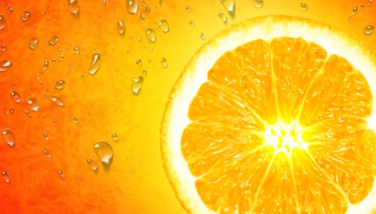 Оранжевый фон с апельсинами