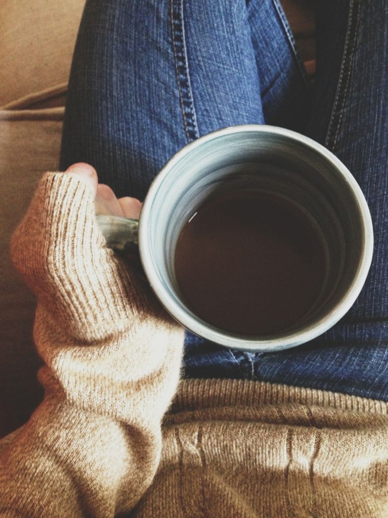 Чашечка кофе в руках