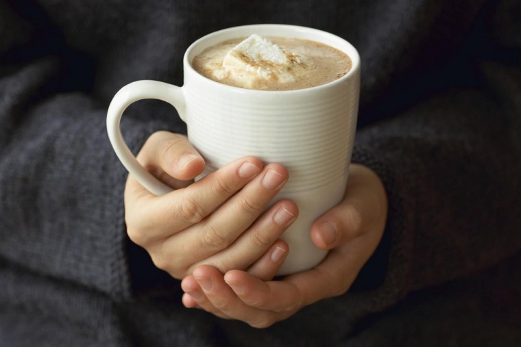 Кружка кофе в руках