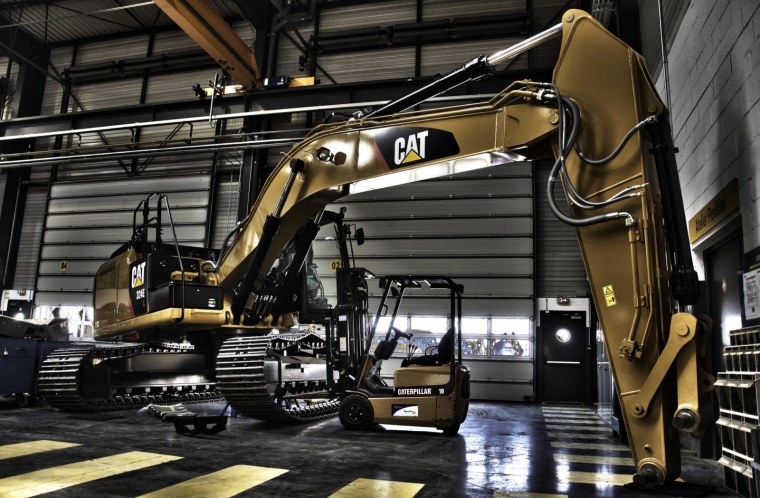 Катерпиллер экскаватор