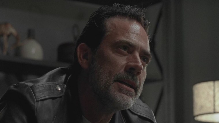 Ниган улыбается