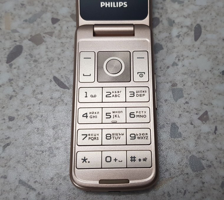 Сотовый телефон Philips e255