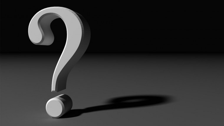 Вопросительный знак на черном фоне
