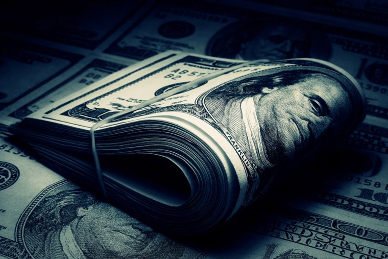 Знак доллара на зеленом фоне