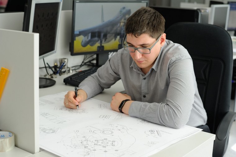 Женщина Архитектор за работой