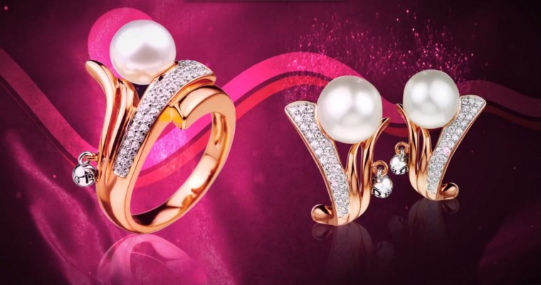 Золотые серьги сердце с фианитами 585