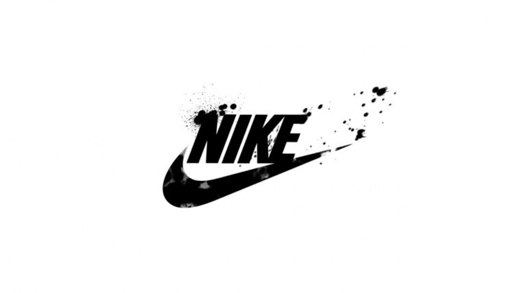 Nike логотип на белом фоне