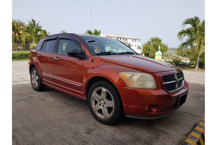 Черный тонированный Додж Калибр