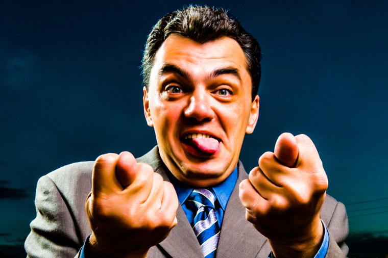 Человек показывает фигу