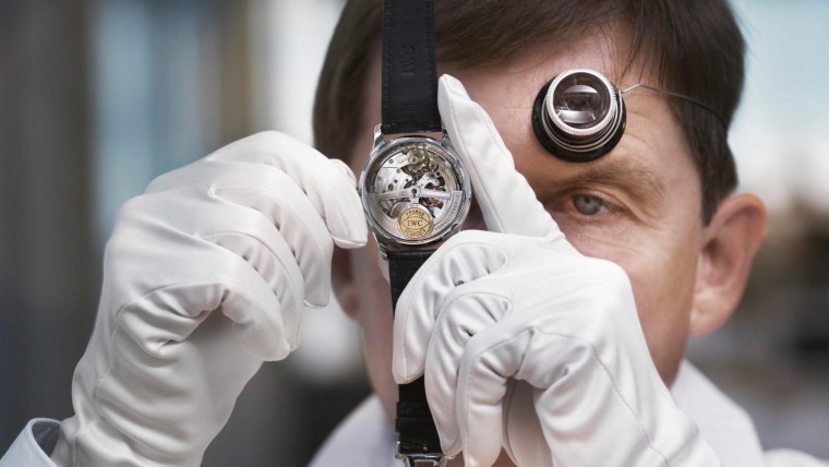 Швейцарский Часовщик