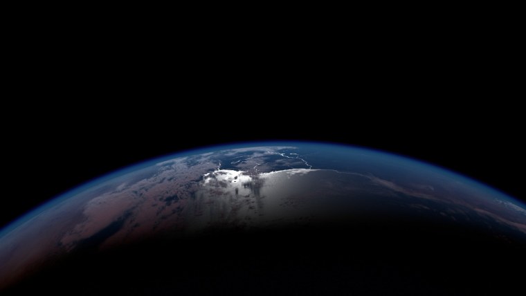Живые обои земля из космоса при Восходе солнца