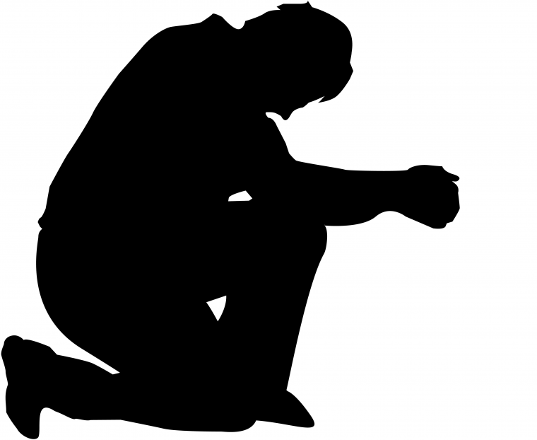 Силуэт человека стоящего на коленях