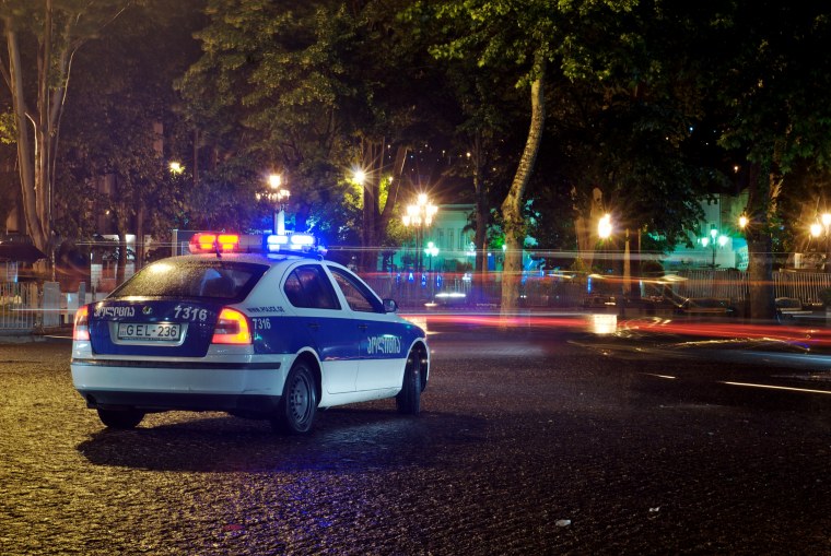 Полицейская машина ночью