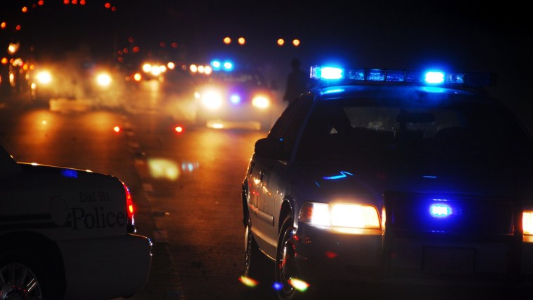 Полицейская машина ночью