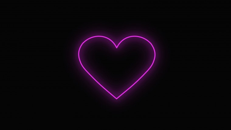 Неоновое сердце на черном фоне