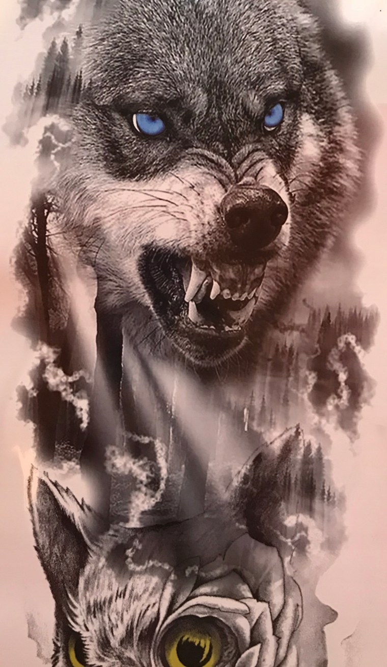 Тату оскал волка