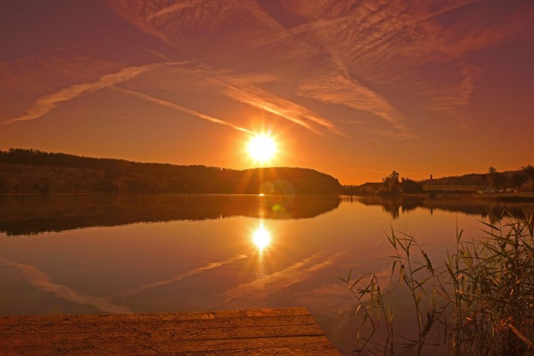 Солнце над рекой