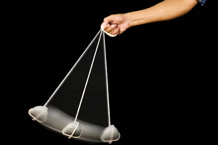 Маятник в руке