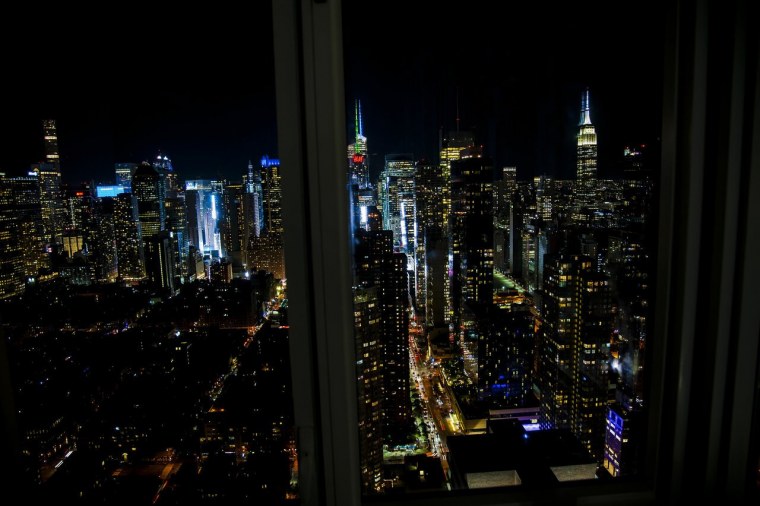 Нью-Йорк ночной Манхэттен с окна